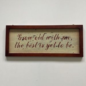 Wooden framed sign with quote